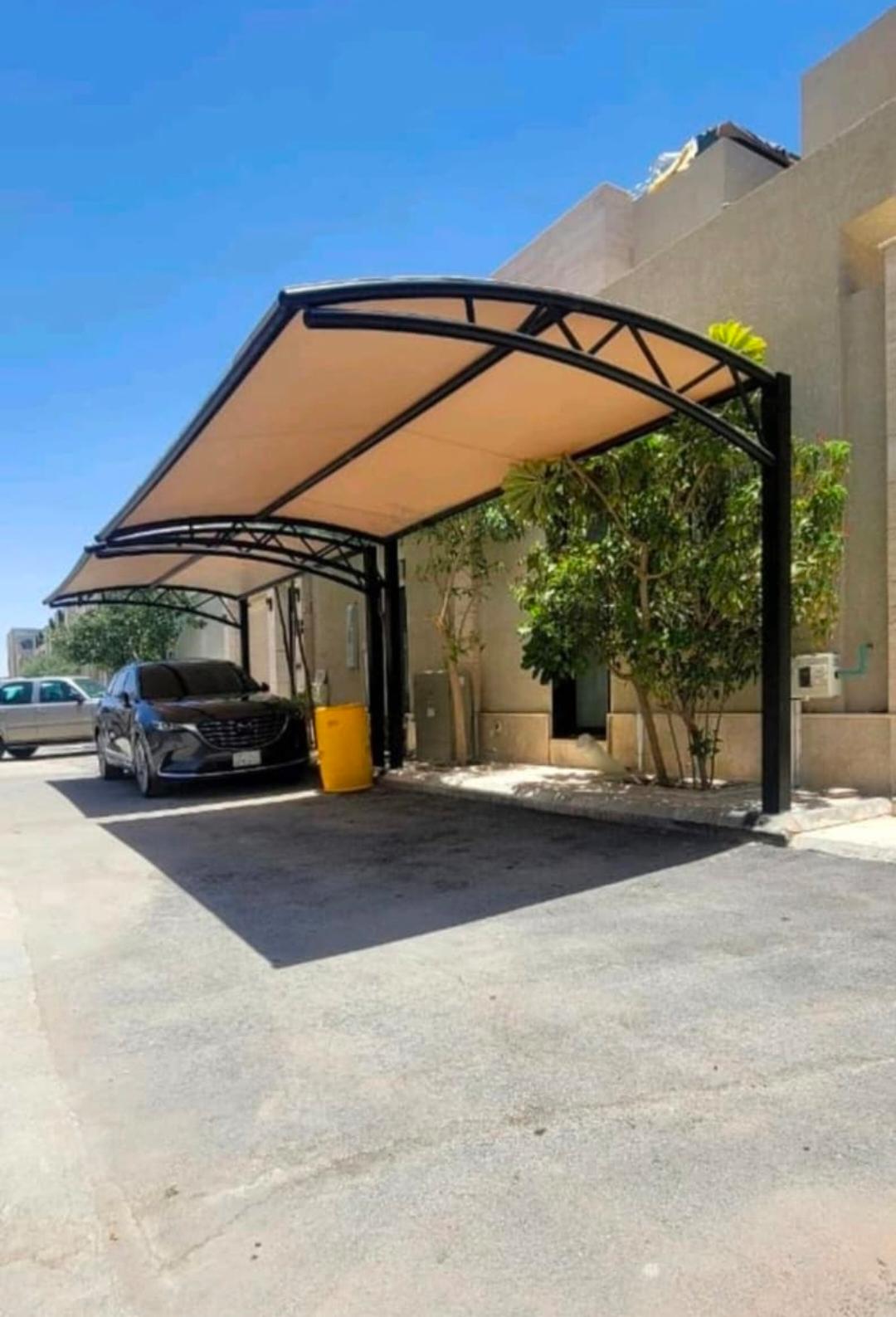 مظلات مواقف سيارات قماش معزول وهياكل حديدية بسماكات معتمدة في المدينة الصناعية بالدمام. مظلات مواقف سيارات قماش معزول وهياكل حديدية بسماكات معتمدة في المدينة الصناعية بالدمام.
